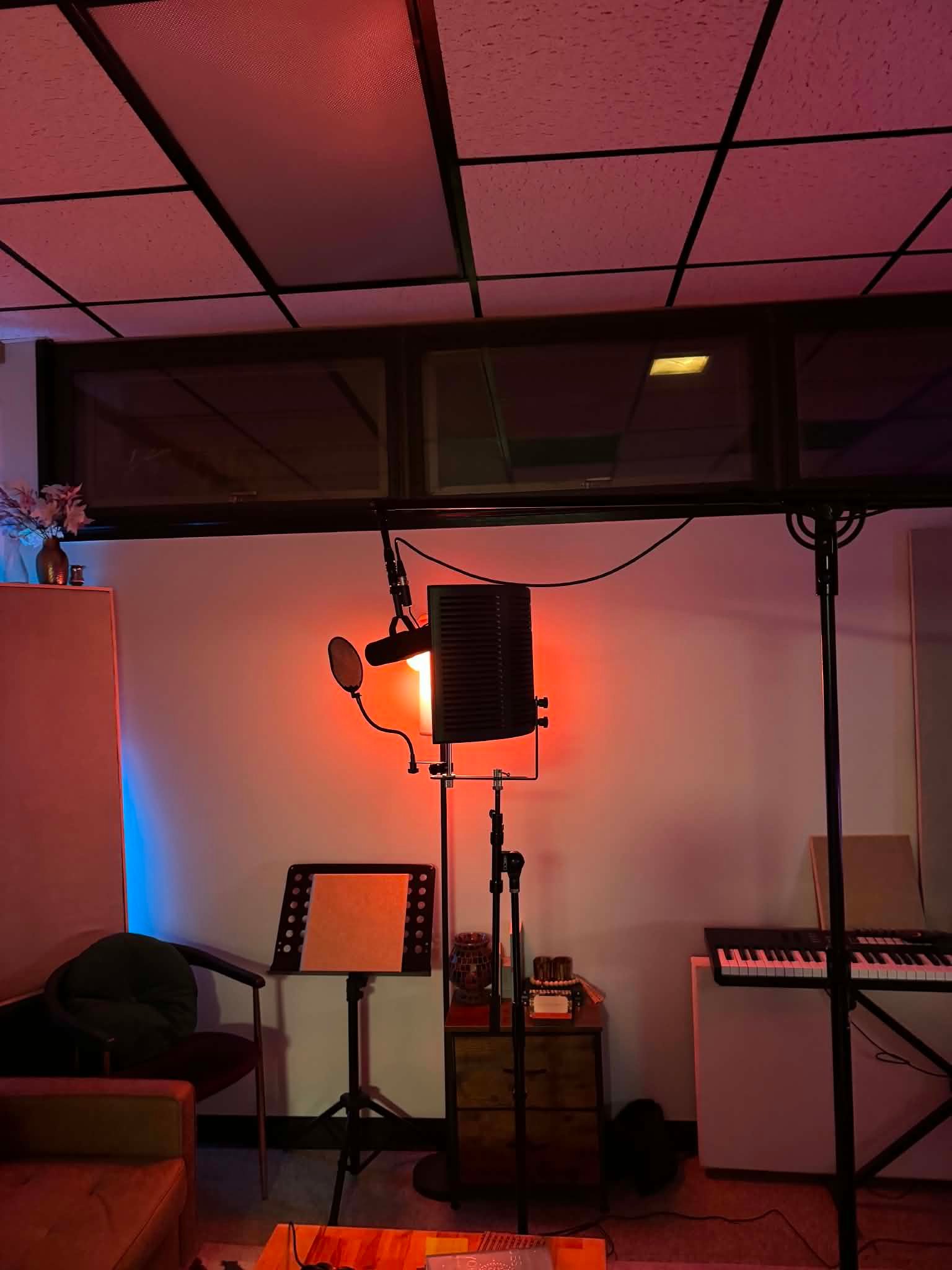 Raphael Ashanti in the studio, pointing toward the camera during a session