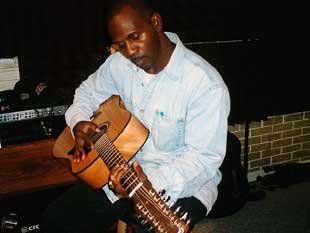 Raphael Ashanti with guitar